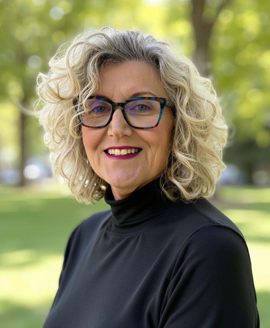 Portrait of Catie Morales, Associate Broker/REALTOR®.